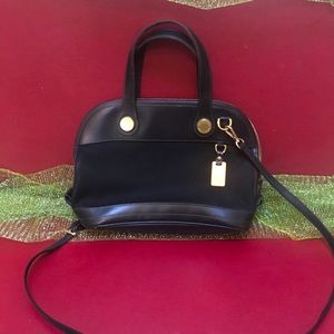 Black Dooney Bourke crossbody purse.